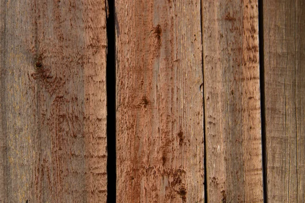 Старая деревянная текстура с потрепанной коричневой краской — стоковое фото