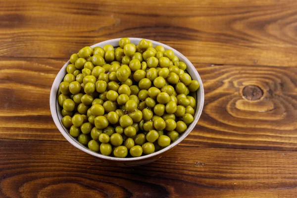 Bowl Canned Green Peas Wooden Table Top View — Stock Photo, Image
