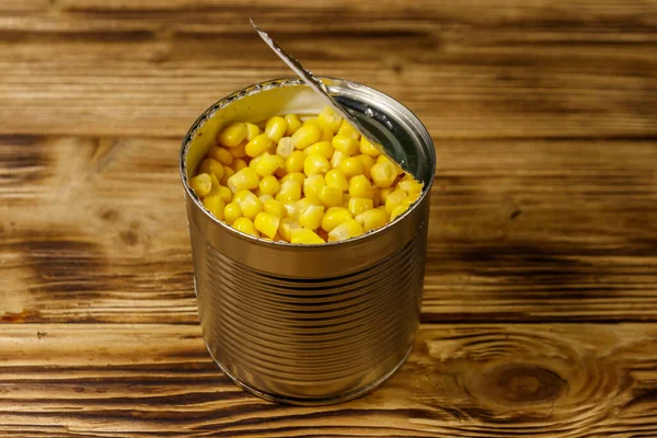 Open Tin Can Corn Wooden Table — Stock Photo, Image