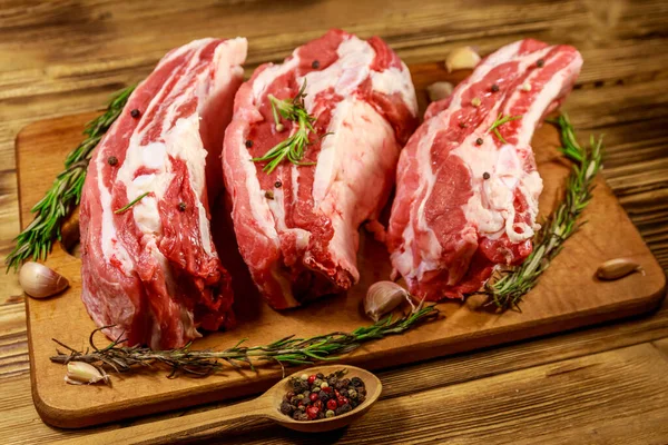 Raw Pork Ribs Spices Garlic Rosemary Wooden Table — Stock Photo, Image