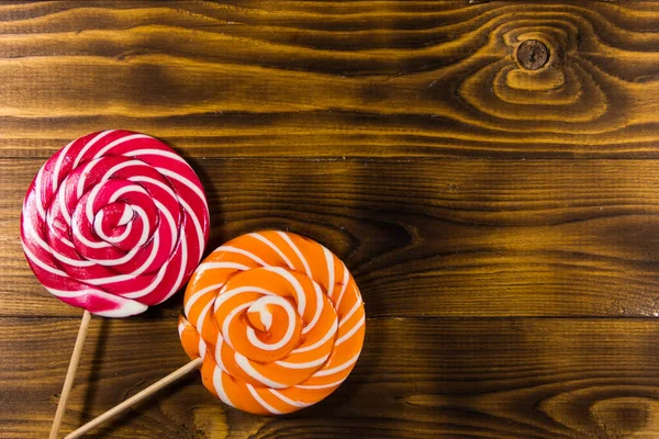 Sweet Lollipops Rustic Wooden Background Top View — Stock Photo, Image