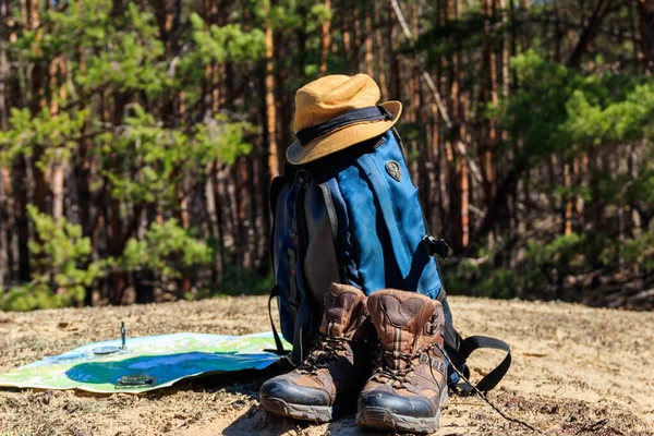 Tourist Backpack Hiking Boots Hat Compass Map Glade Pine Forest — Stock Photo, Image