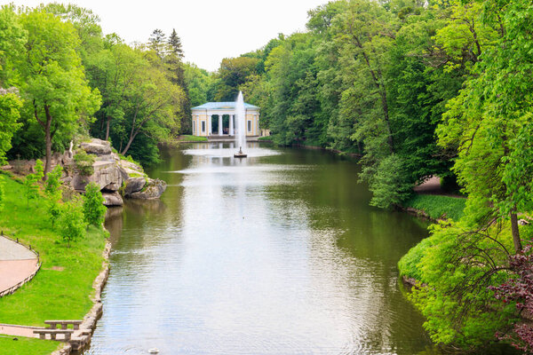 View of a lake with Snake Fountain and Flora Pavilion in Sofiyivka park in Uman, Ukraine