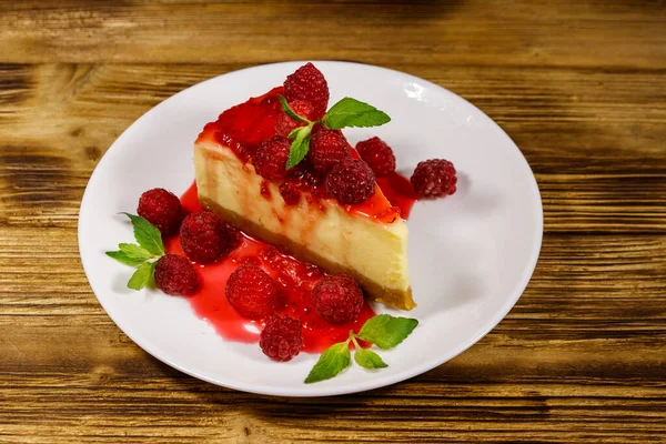 Piece Tasty New York Cheesecake Raspberries Raspberry Jam White Plate — Stock Photo, Image