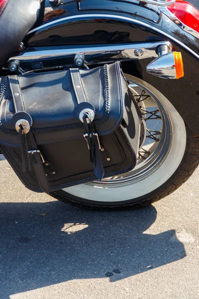 Leather biker bag on a motorcycle close-up. Concept travel on a motorcycle