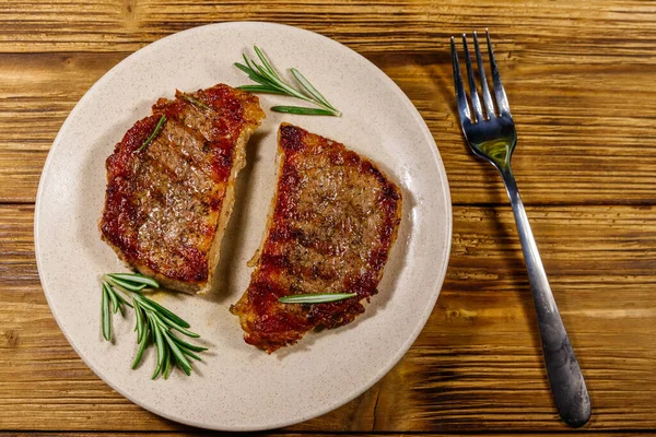 Grilled Pork Steaks Rosemary Wooden Table Top View — Stock Photo, Image