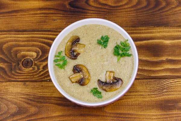 Mushroom cream soup on a wooden table. Top view — Stock Image Mushroom Cream Soup Wooden Table Top View Royalty Free Stock Images