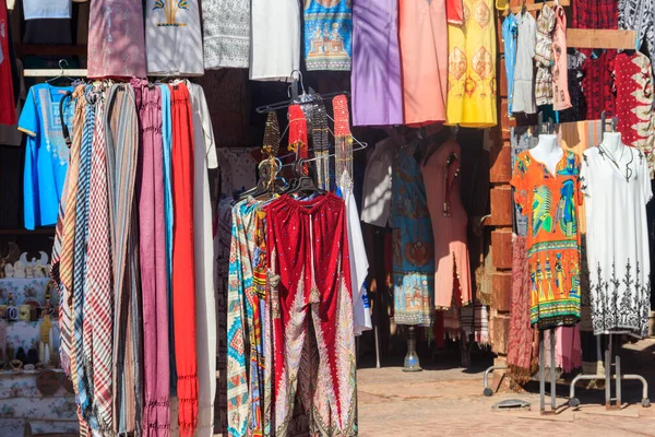 Clothing and accessories for sale at street oriental bazaar in Egypt