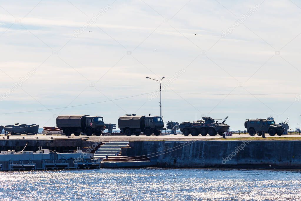 Military vehicles at a pier in Kronstadt, Russia