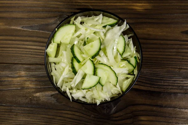 Spring Vegan Salad Cabbage Cucumber Glass Bowl Wooden Table Top — Stock Photo, Image