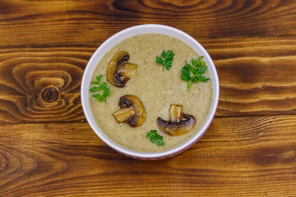 Mushroom cream soup on a wooden table. Top view — Stock Image Mushroom Cream Soup Wooden Table Top View Stock Photo
