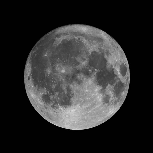 Full moon isolated on black night sky background. 99,7% of Moon visible just before full moon phase.