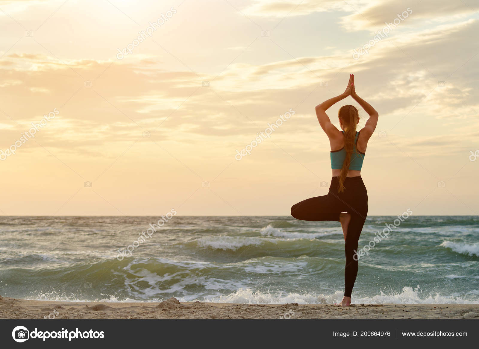 5 Yoga poses to keep practicing this summer from the beach