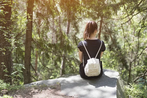 Girl Backpack Sitting Rock Forest Summer Sunny Day — Stock Photo, Image