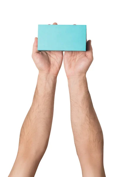Türkiz téglatestben férfi kezében. Felülnézet. Elkülönítése — Stock Fotó
