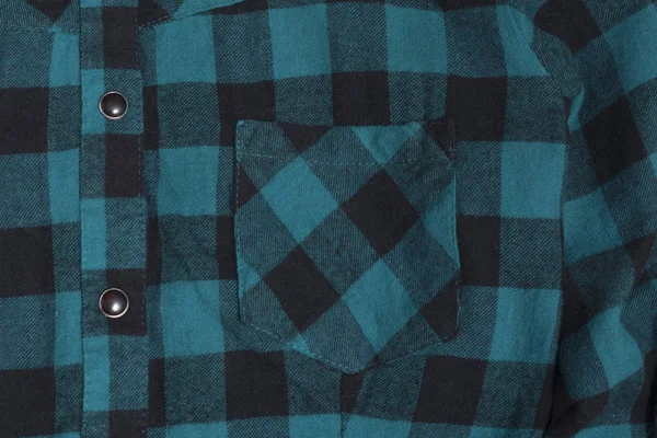 Pocket of checkered black and green textured fabric. Close-up — Stock Photo, Image
