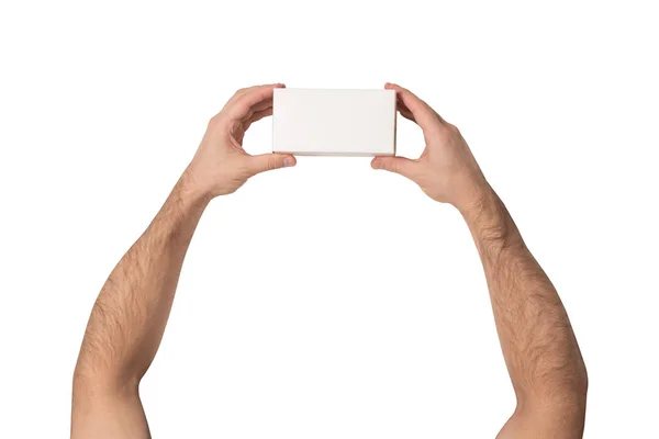 Fehér téglalap alakú doboz férfi kezében. Felülnézet. Elkülönítése — Stock Fotó