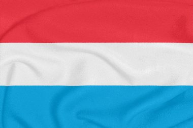 Dokulu kumaş üzerinde Lüksemburg Bayrağı. Vatansever sembolü