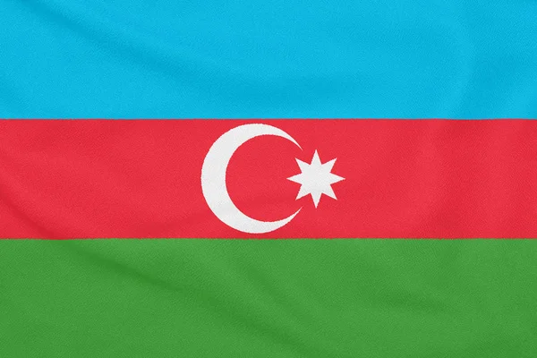 Флаг Азербайджана на текстурированной ткани. Патриотический символ — стоковое фото