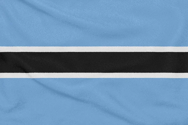 Bandiera del Botswana su tessuto strutturato. Simbolo patriottico — Foto Stock