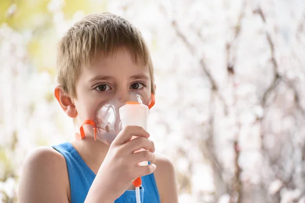 Boy of school age makes inhalation at home. Prevention — Stock Photo, Image