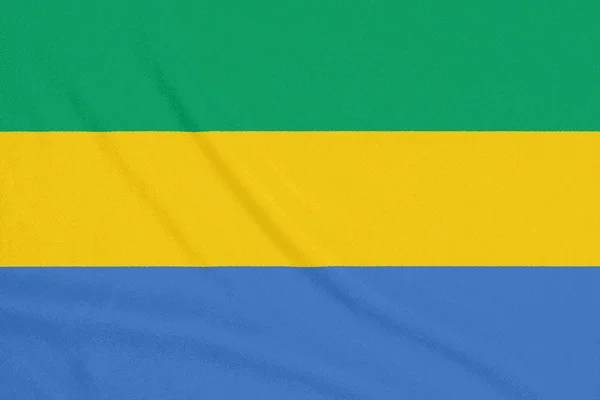 Flaga Gabonu na tkaninie teksturowanej. Symbol patriotyczny — Zdjęcie stockowe