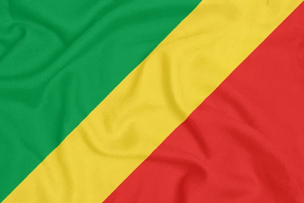 Флаг Республики Конго на текстурированной ткани. Патриотический символ — стоковое фото