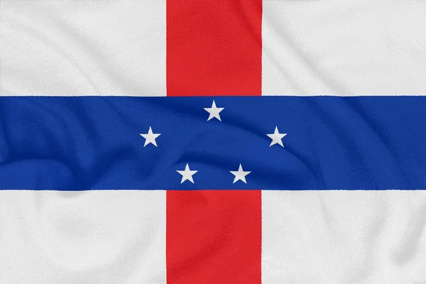 荷属安的列斯群岛国旗在纹理织物上。爱国符号 — 图库照片