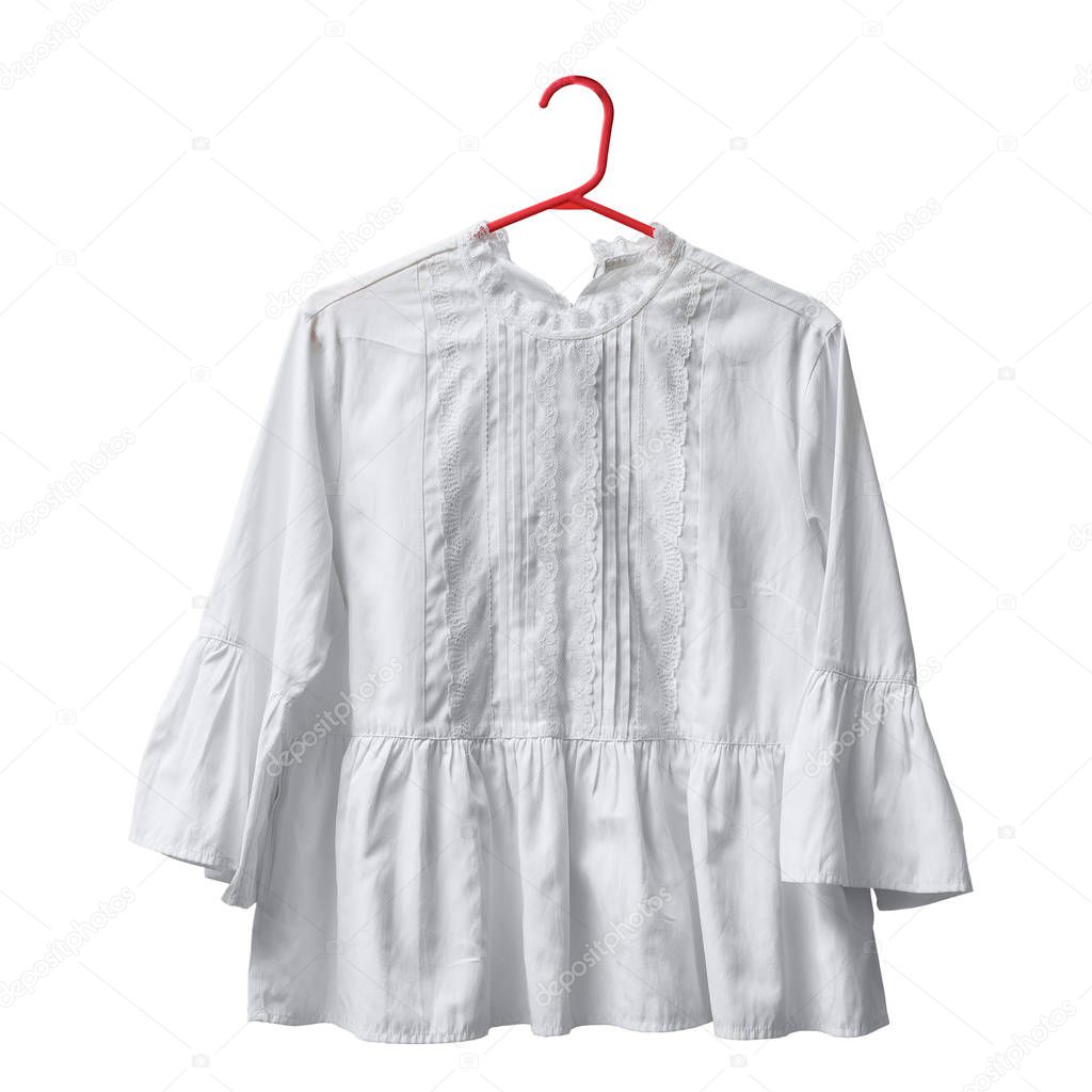 White blouse with sleeve on a hanger. White background. Isolate