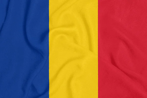 Vlag van Roemenië op getextureerde stof. Patriottisch symbool — Stockfoto