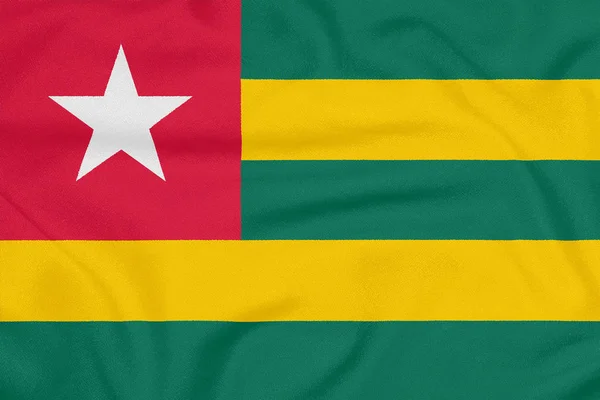 Drapeau du Togo sur tissu texturé. Symbole patriotique — Photo