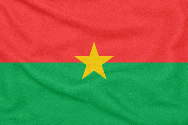 Drapeau du Burkina Faso sur tissu texturé. Symbole patriotique — Photo