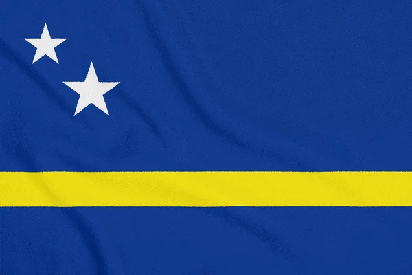 Σημαία του Κουρασάο σε υφή υφάσματος. Πατριωτικό σύμβολο — Φωτογραφία Αρχείου