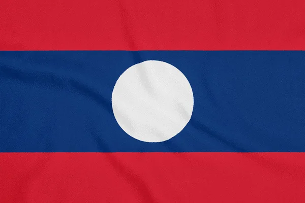 Flagge von Laos auf texturiertem Stoff. Patriotisches Symbol — Stockfoto