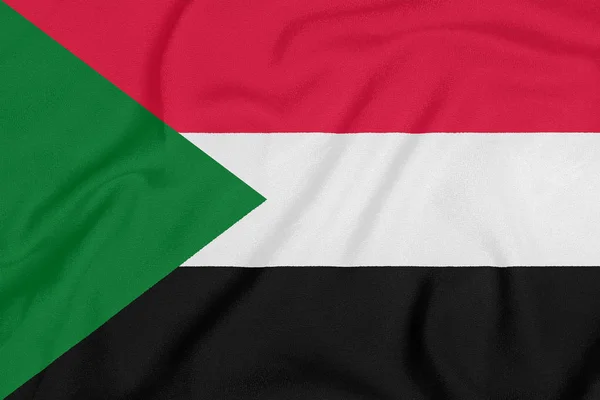 Σημαία του Σουδάν με υφή υφάσματος. Πατριωτικό σύμβολο — Φωτογραφία Αρχείου
