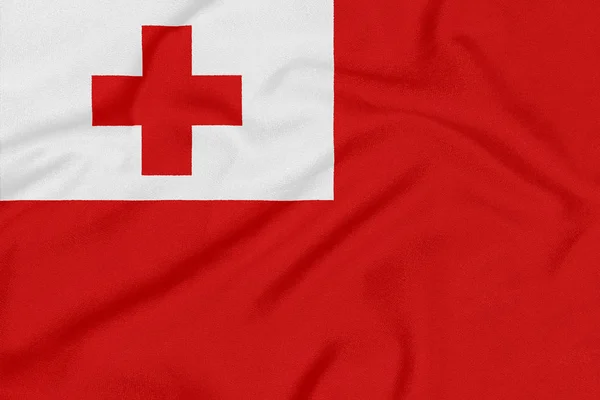 Bandeira de Tonga em tecido texturizado. Símbolo patriótico — Fotografia de Stock