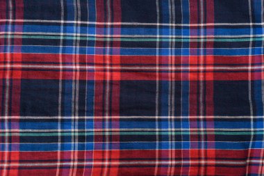 Kırmızı damalı dikişsiz kumaş ile mavi. Dokusal arka plan