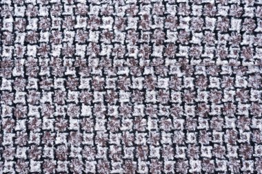 Diş deseni ile gri ve beyaz yün kumaş. Arka plan. Yakın çekim