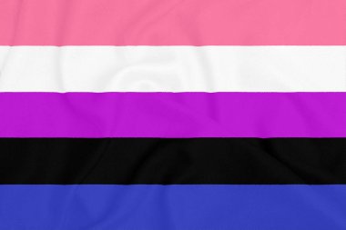 Dokulu bir kumaş üzerinde LGBT genderfluid gurur topluluk bayrağı. Gurur sembolü