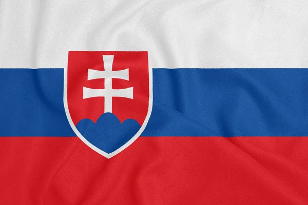 Bandeira da Eslováquia em tecido texturizado. Símbolo patriótico — Fotografia de Stock
