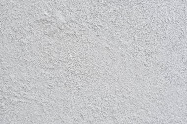 Pürüzlü sıvalı gri yüzey. Arka planlar ve dokular
