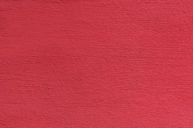 Parlak pürüzlü sıvalı yüzey. Yaşayan mercan renkli. Arka planlar ve dokular