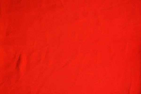 Crumpled texture of bright red seamless fabric. — Stock Photo, Image