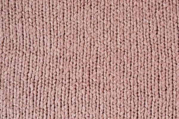 Tejido de textura sin costura de punto. Suéter de cerca. Rosa pálido — Foto de Stock
