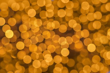 Bokeh bulanık altın daireler. Soyut arka plan
