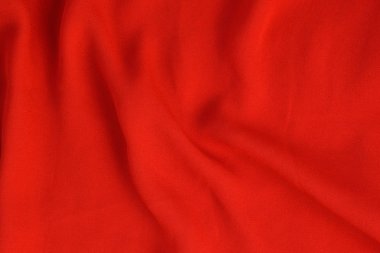 Parlak kırmızı dikişsiz kumaş Buruşuk doku.