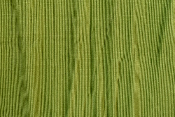 Tissu de coton texturé vert froissé. Texture nervurée. Fond sans couture . — Photo