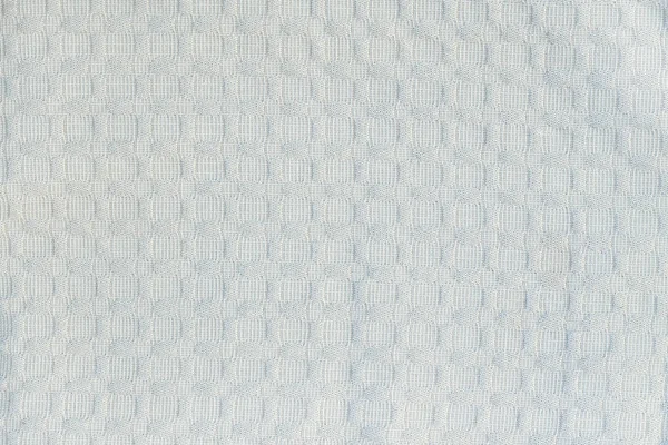 Bledě modrá texturovaná textilie, obdélníky. Plné hladké pozadí. — Stock fotografie