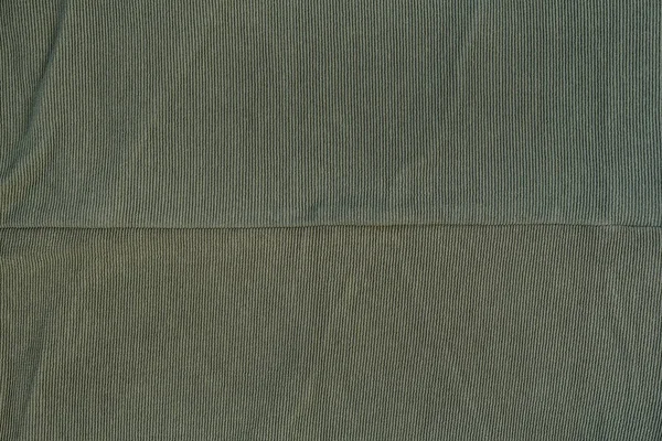 Texturerat ribbat tyg, söm i mitten. Khaki färg. Närbild — Stockfoto