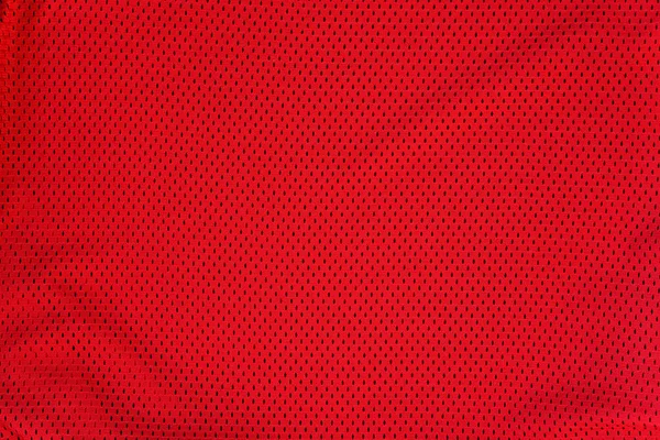 Textured bright red mesh fabric. Folds — Stock Photo, Image
